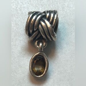 Authentic Pandora Retired Sterling Silver Knot Charm with Amber Stone